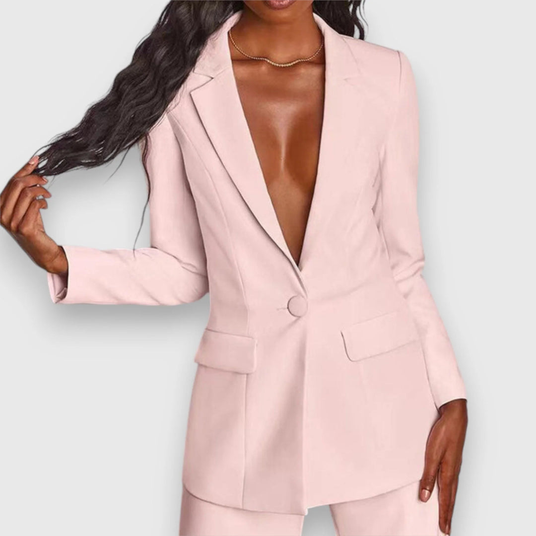 Close-up view of tailored blazer with notch lapels and single-button closure on women's suit set