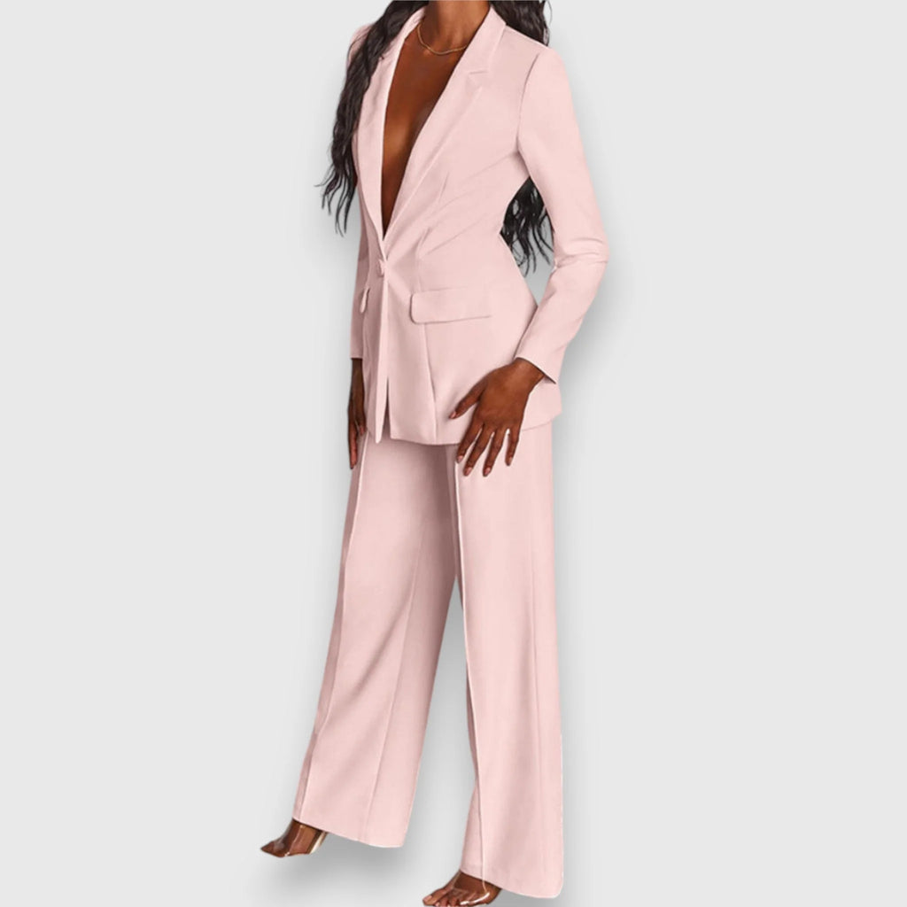 Side angle of women's wide-leg trousers showing high-rise waist and full-length cut