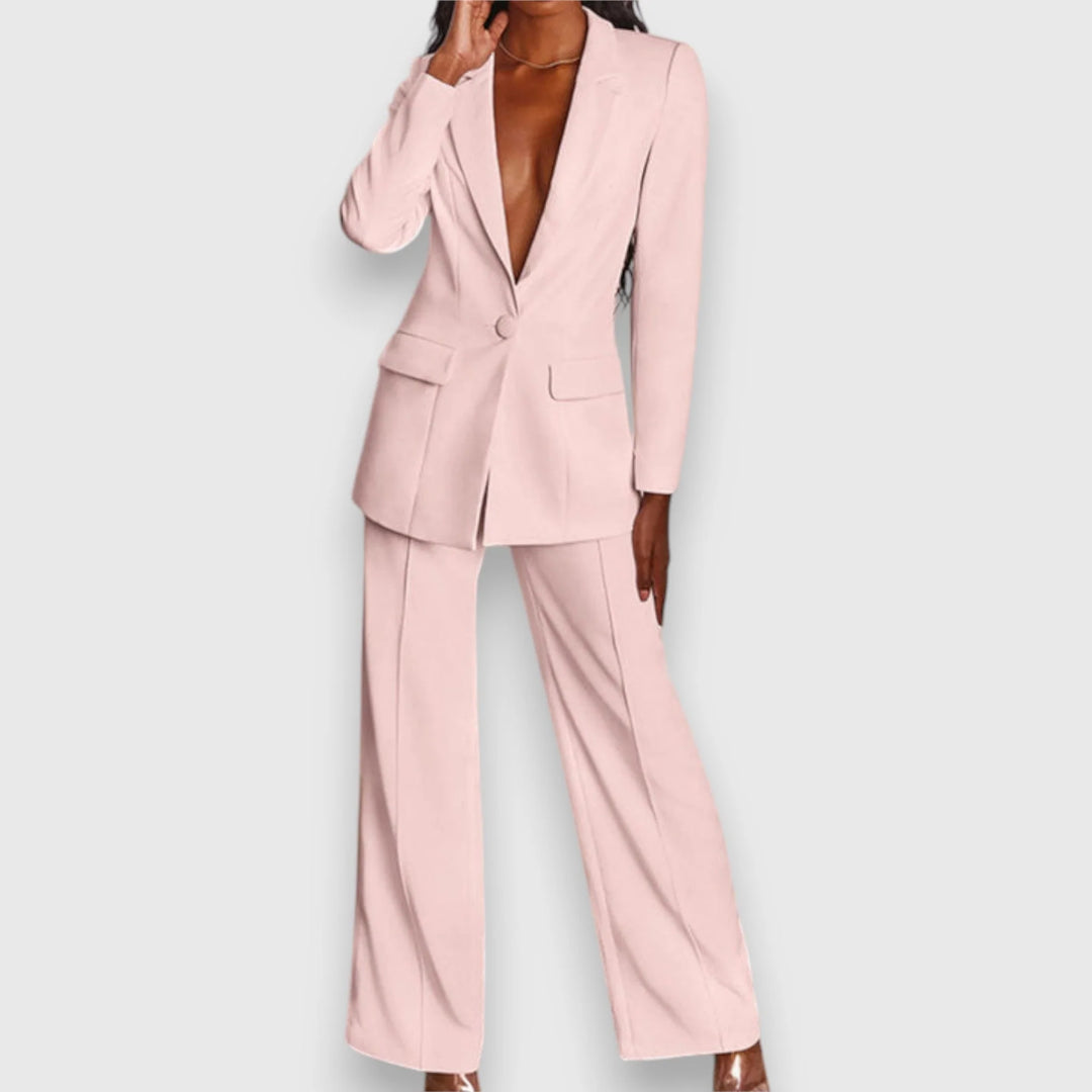 Detail of flap pockets and structured fabric on women's tailored blazer