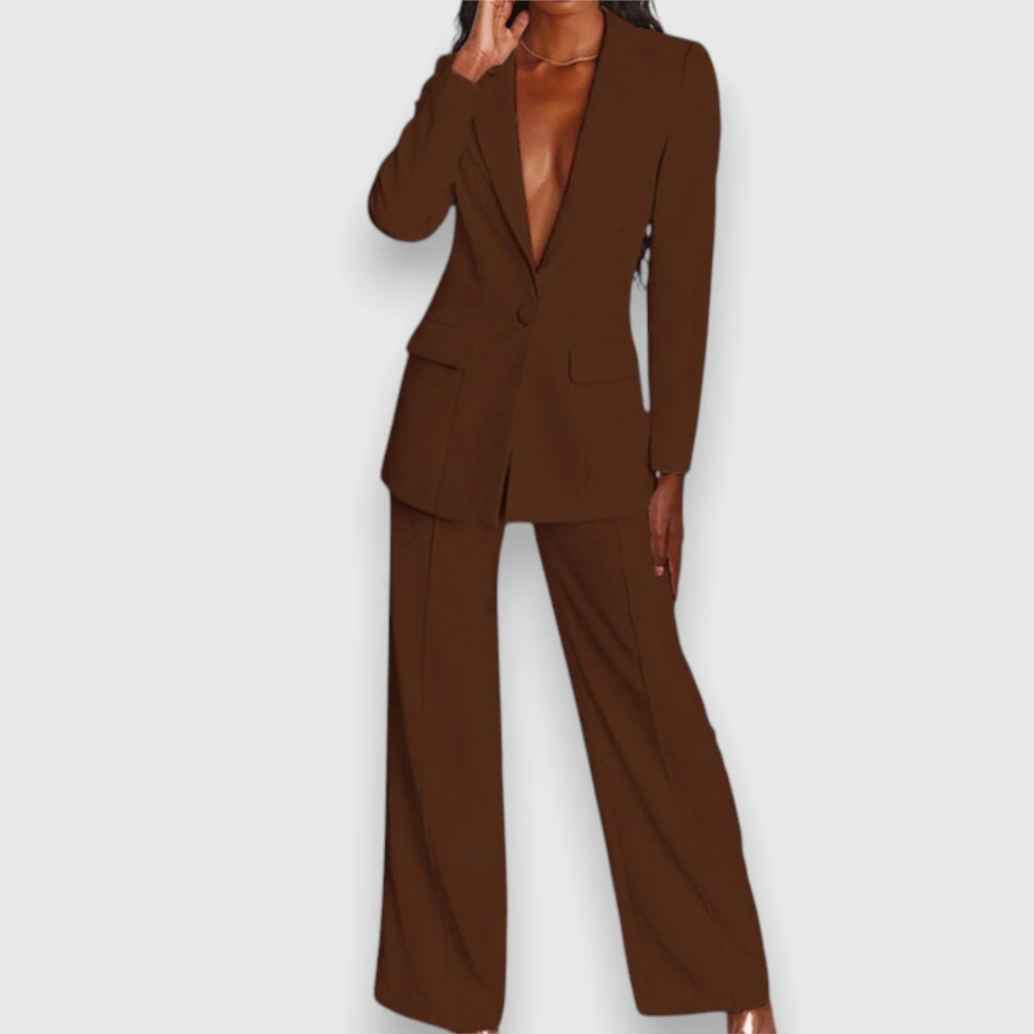 Back view of women's tailored suit set showing blazer fit and trouser drape