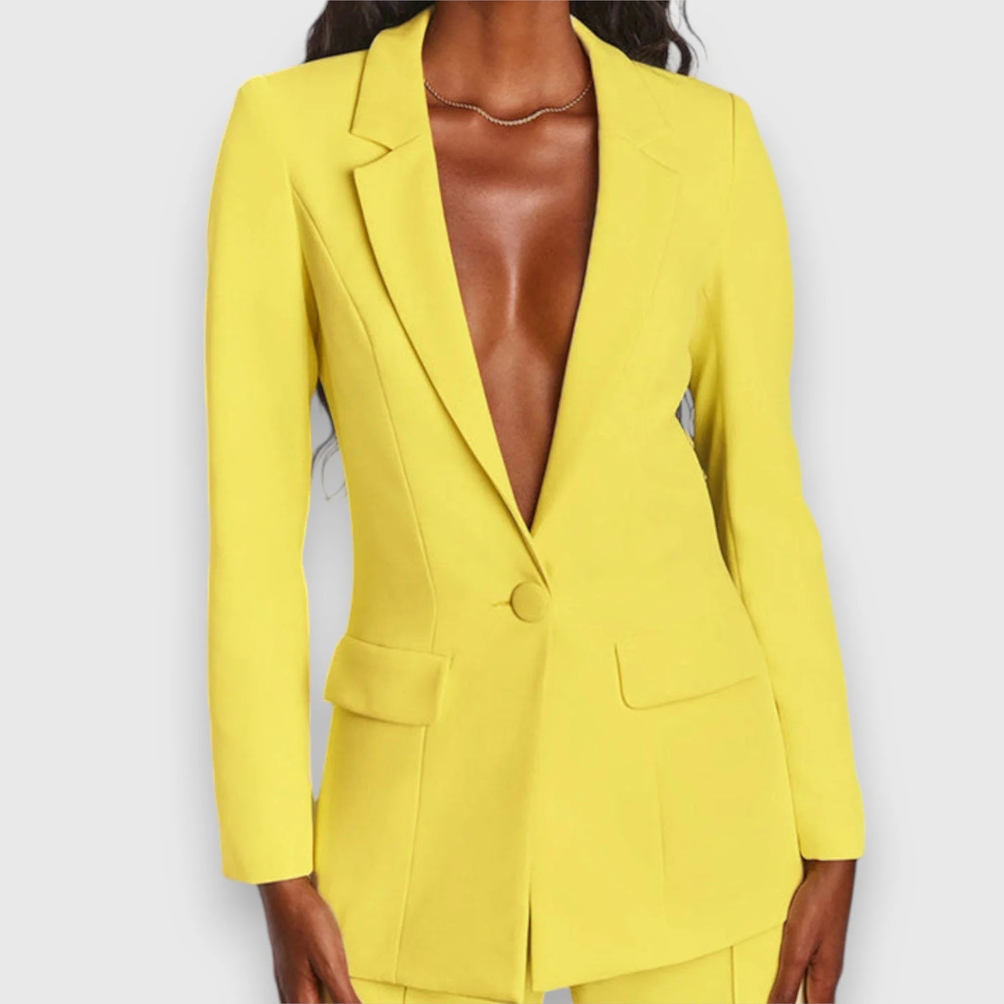 Women's tailored suit set in brown colourway showing blazer and trouser pairing