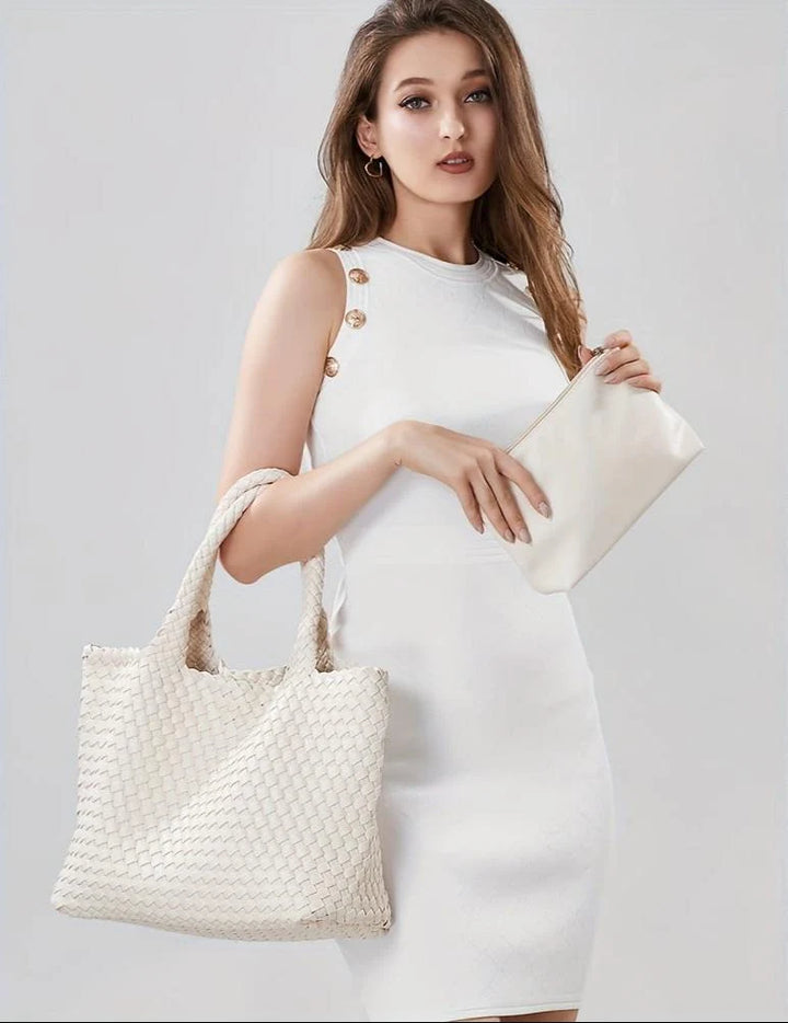 Dark grey woven tote bag showing relaxed yet structured rectangular silhouette