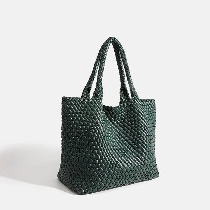 Front view of structured woven tote bag with seamless basket weave pattern