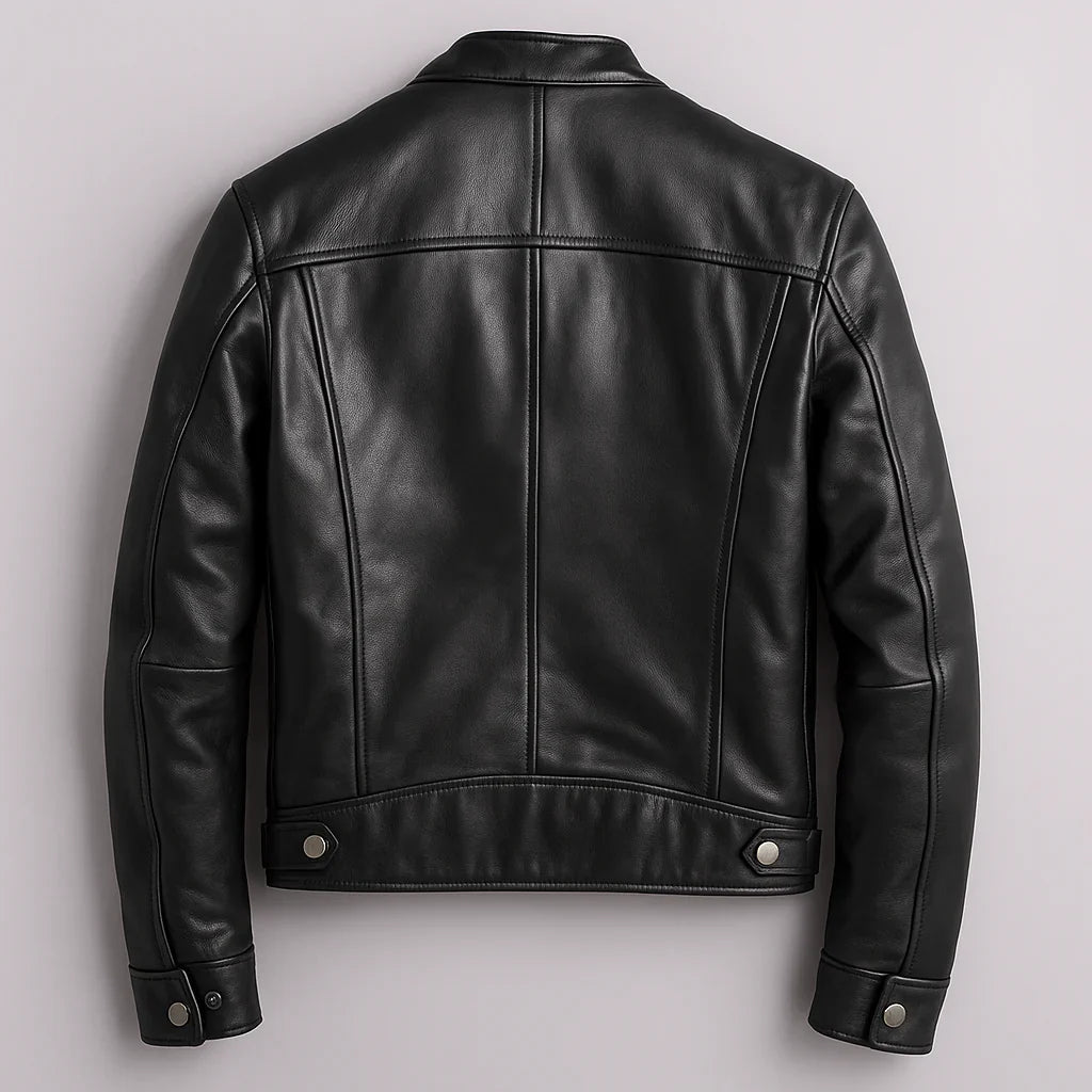 Full-length view of men's biker jacket styled with dark trousers for casual wear