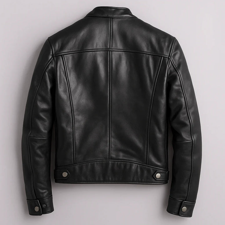 Full-length view of men's biker jacket styled with dark trousers for casual wear