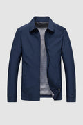 Close-up of men's Harrington jacket zip closure and smooth woven fabric construction