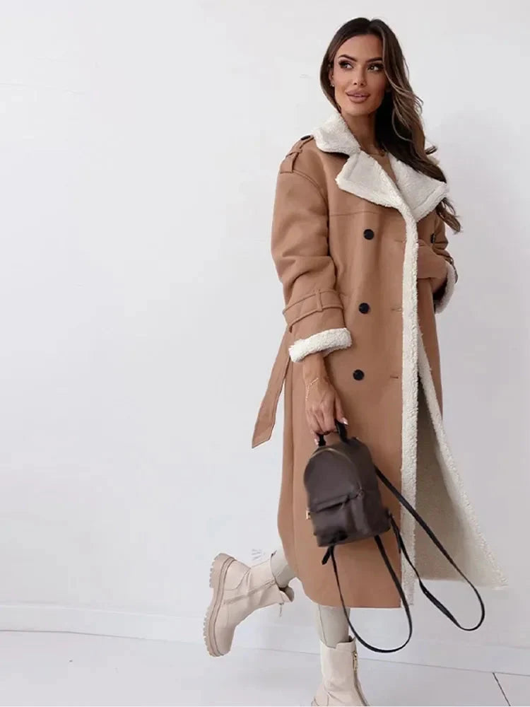 Back view of women's belted trench coat with full-length sleeves and smooth finish