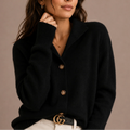 Women's collared knit cardigan in black with button-up front and relaxed fit