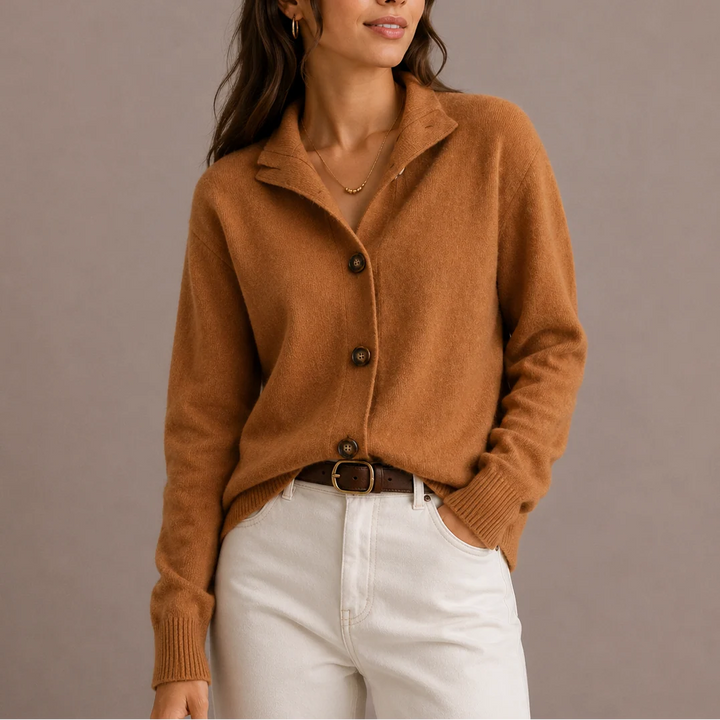 Close-up of collared knit cardigan showing soft knit texture and button detail