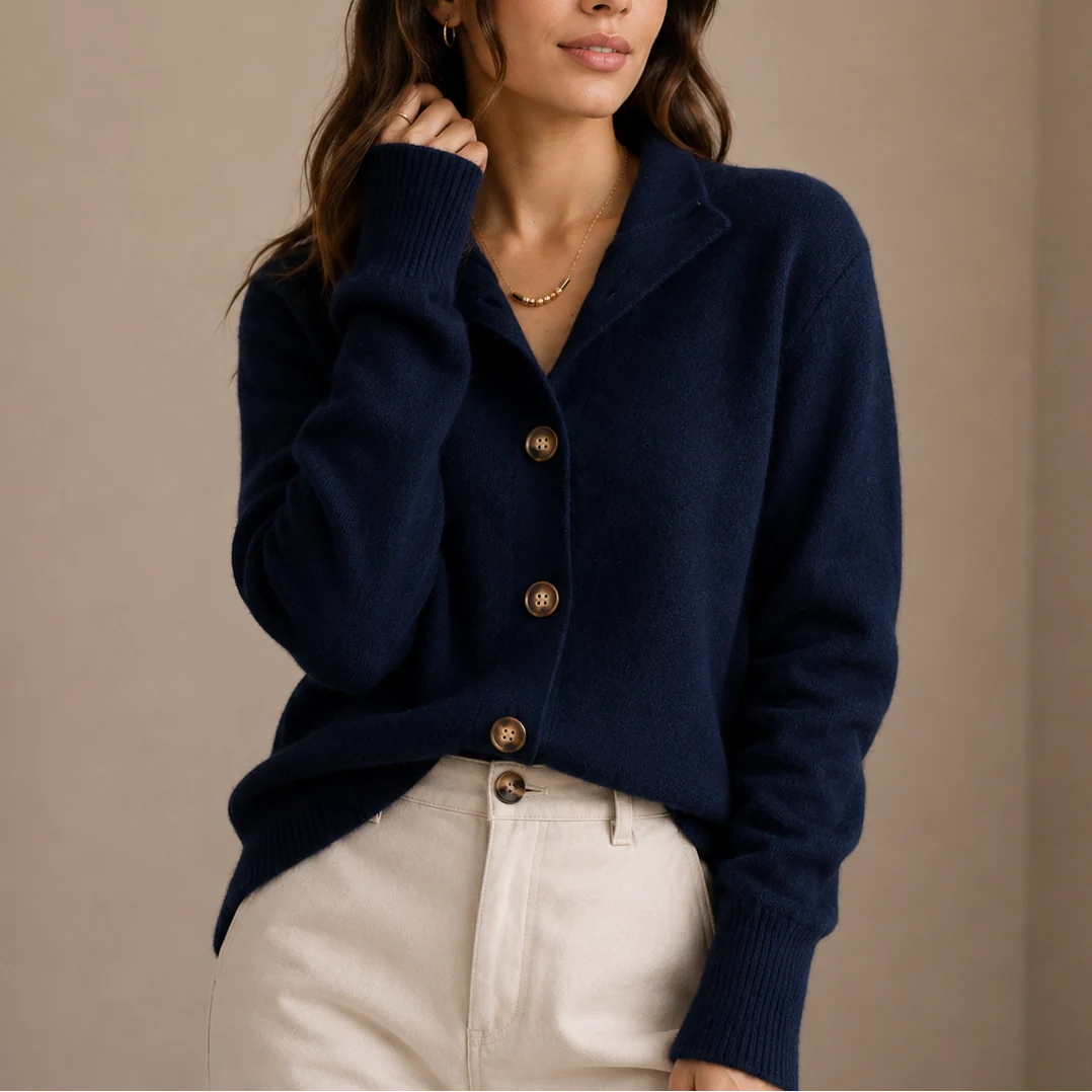 Relaxed fit collared cardigan in black with classic button-up front and ribbed hem
