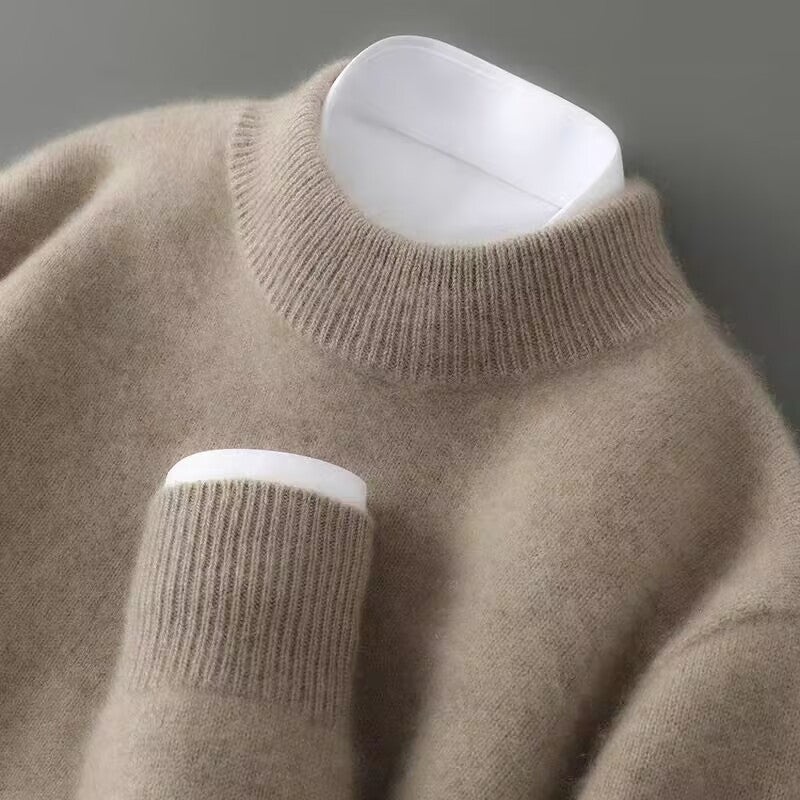 Close-up of crew neck jumper showing ribbed collar and cuff construction