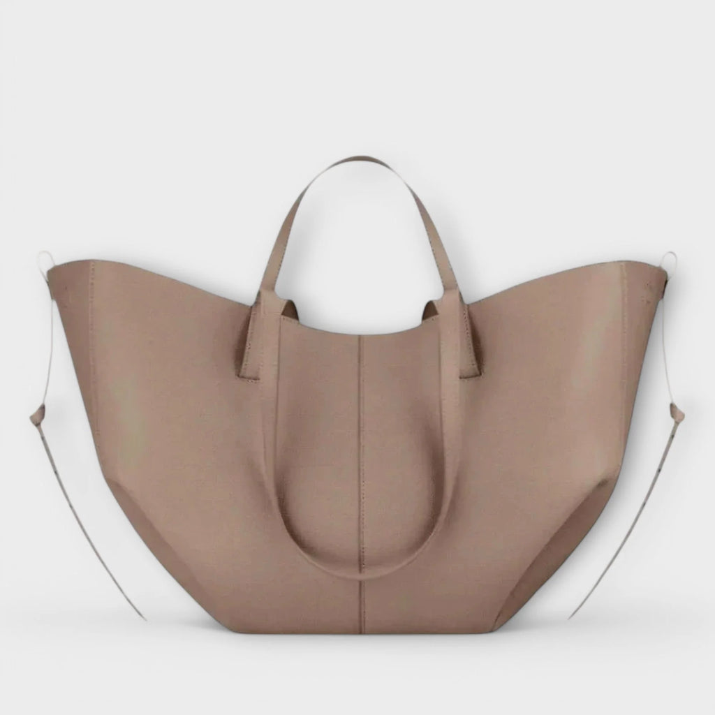 Women's curved tote bag in taupe with dual handles and detachable shoulder strap on white background