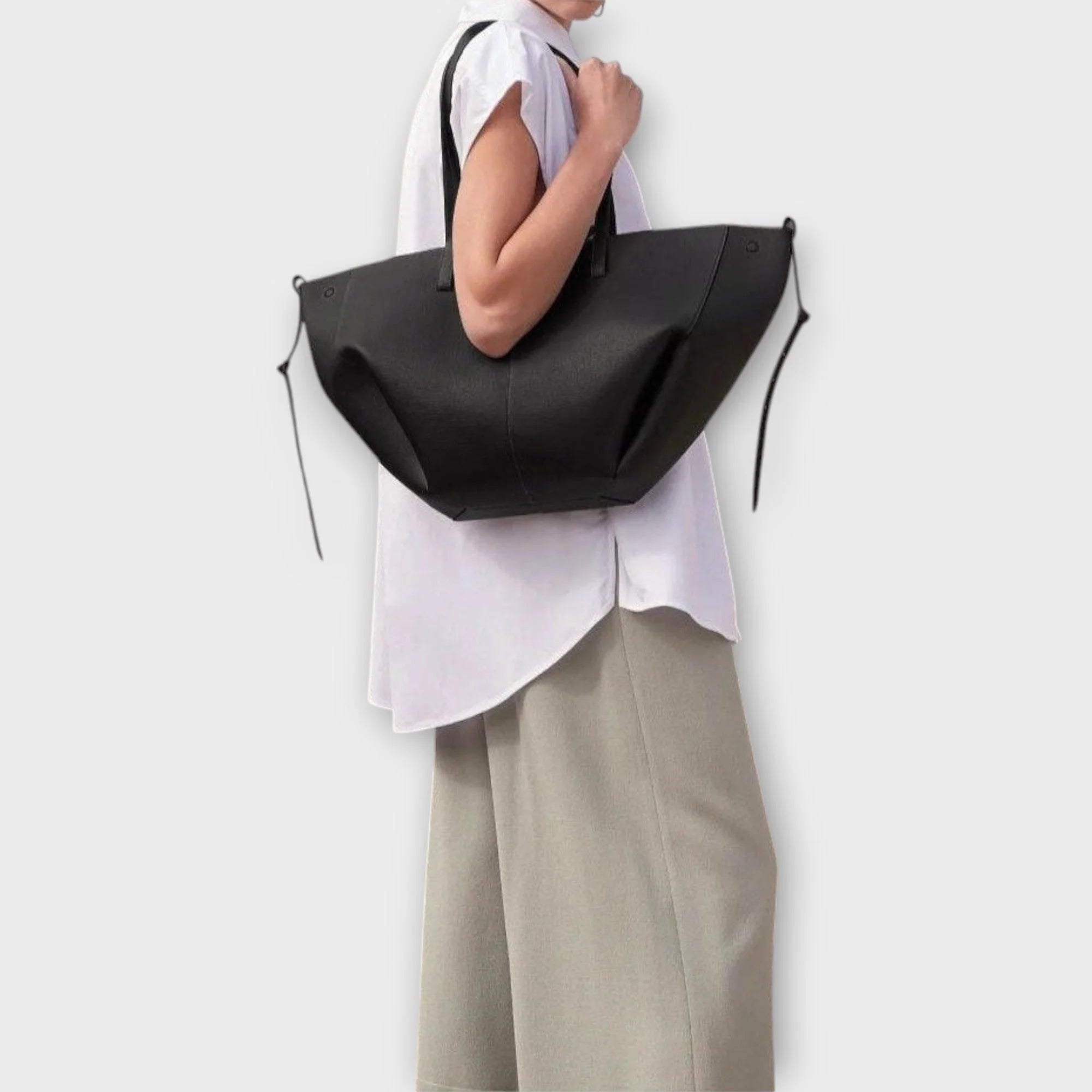 Taupe minimalist tote bag lifestyle image demonstrating spacious interior for daily essentials