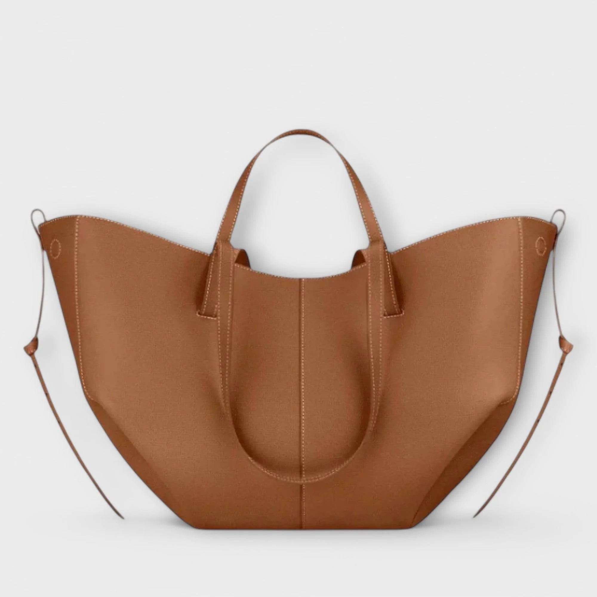 Taupe curved tote bag front view showing magnetic closure and centre panel stitching detail
