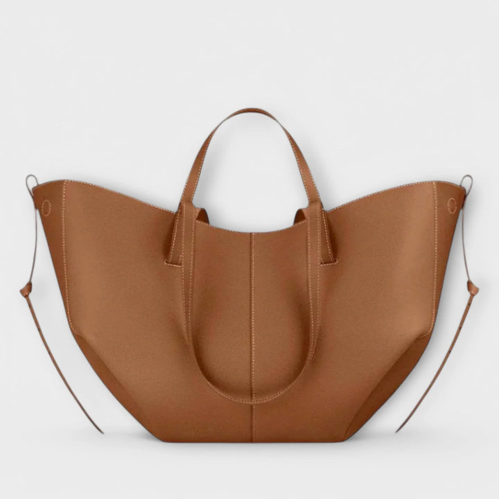 Taupe curved tote bag front view showing magnetic closure and centre panel stitching detail