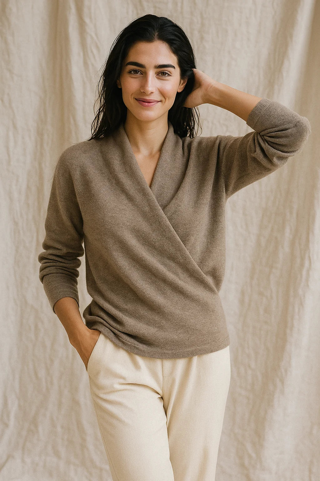Side angle of mohair sweater showing ribbed cuffs and soft knit drape
