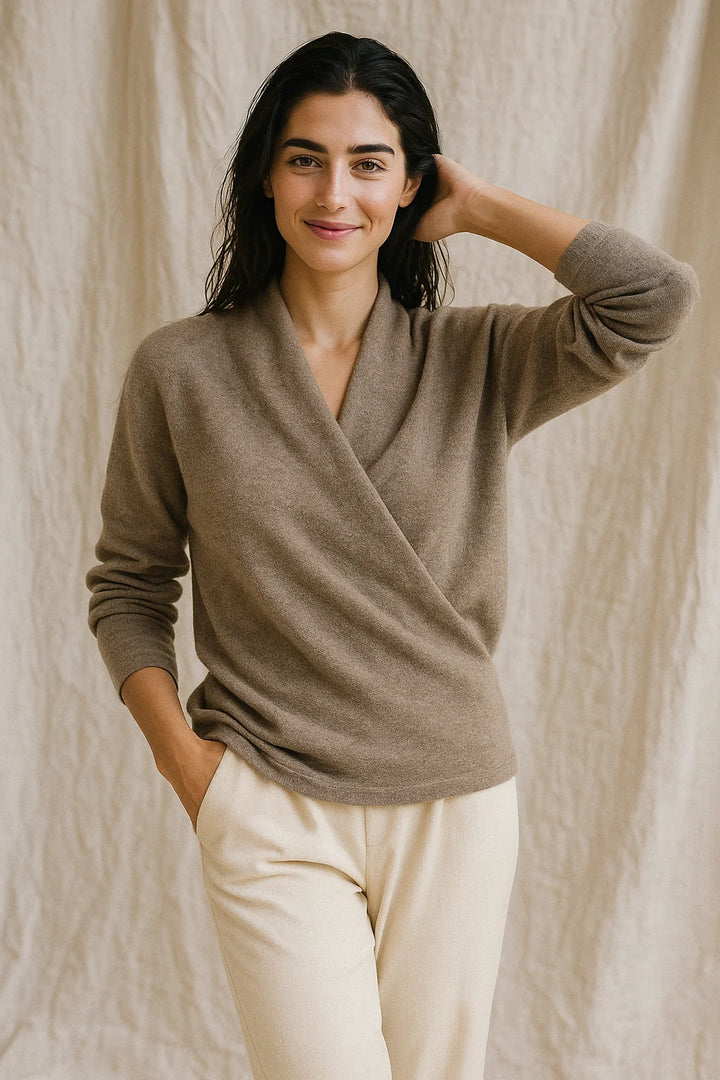 Side angle of mohair sweater showing ribbed cuffs and soft knit drape