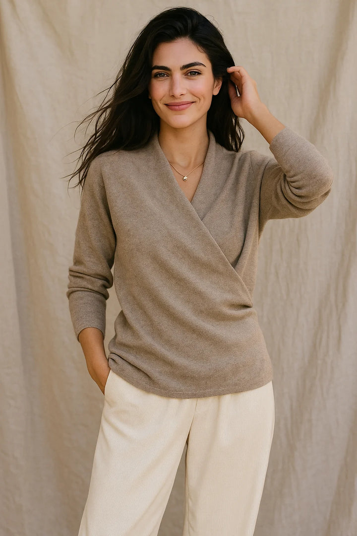 Women's mohair sweater in taupe paired with pleated trousers for smart-casual style