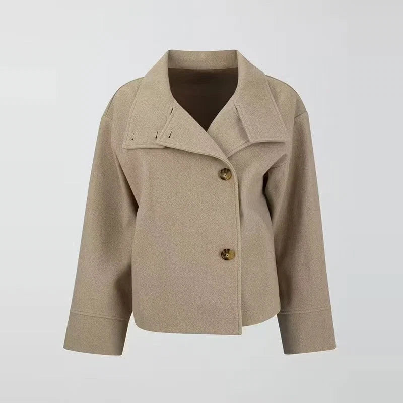 Full-length view of relaxed women's wool coat showing oversized silhouette and structured fit