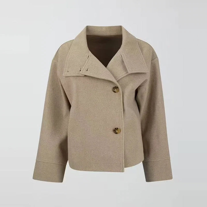 Full-length view of relaxed women's wool coat showing oversized silhouette and structured fit