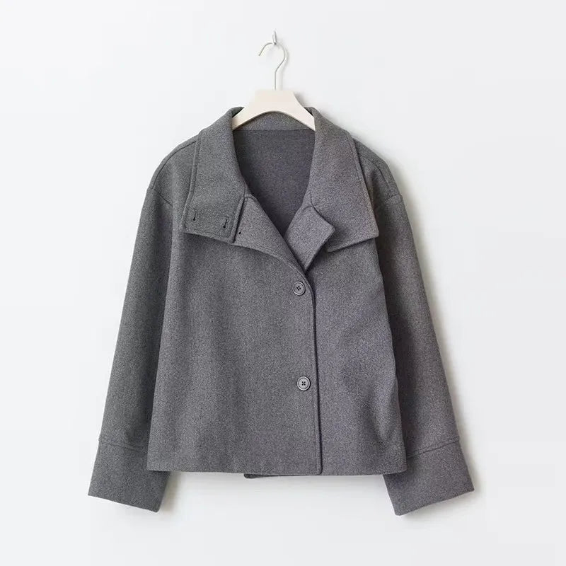 Women's wool coat in black paired with casual outfit for everyday city wear