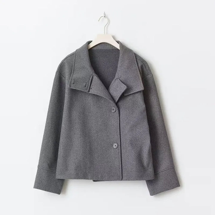 Women's wool coat in black paired with casual outfit for everyday city wear