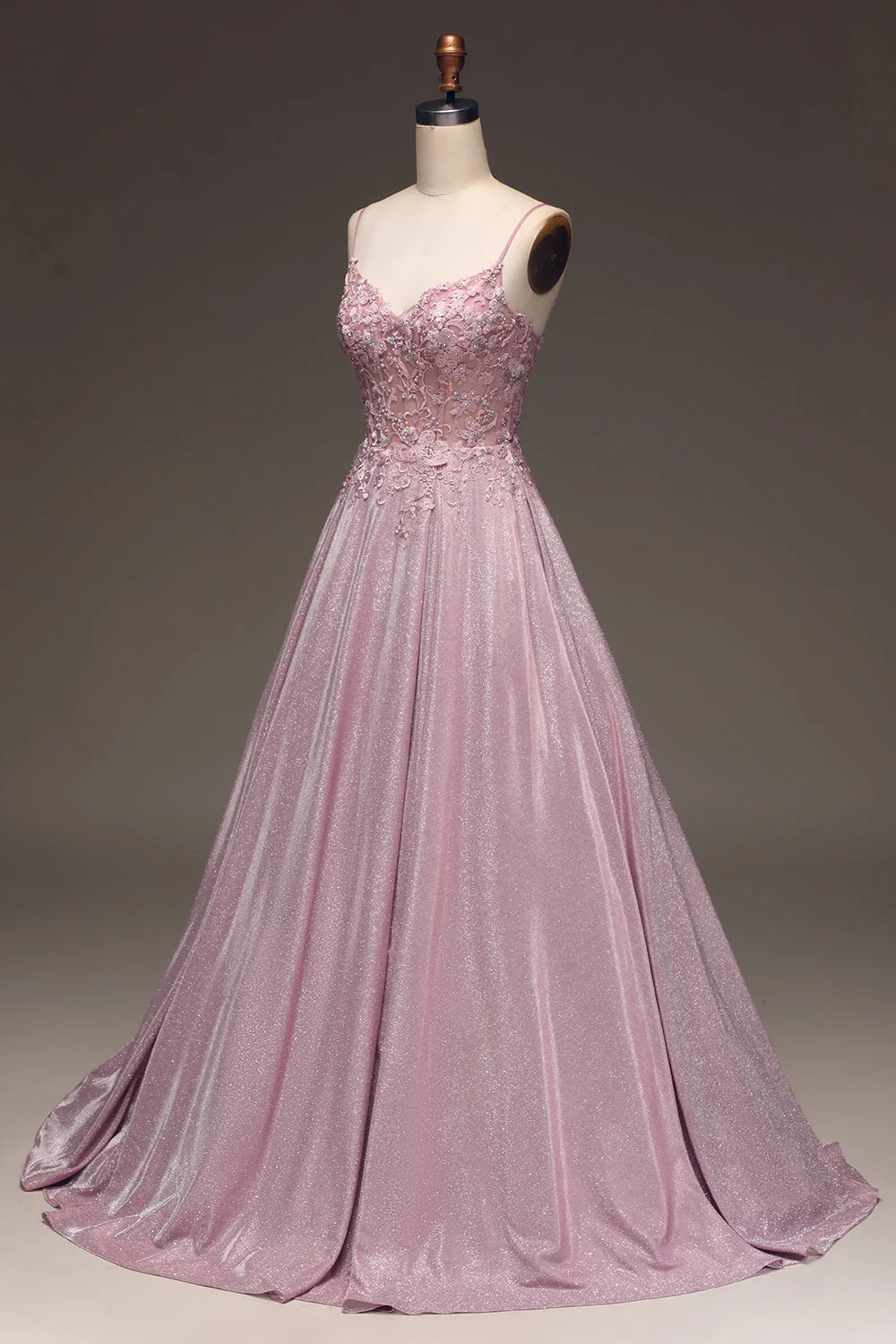 Embellished maxi dress hemline detail displaying shimmering tulle overlay and soft finish