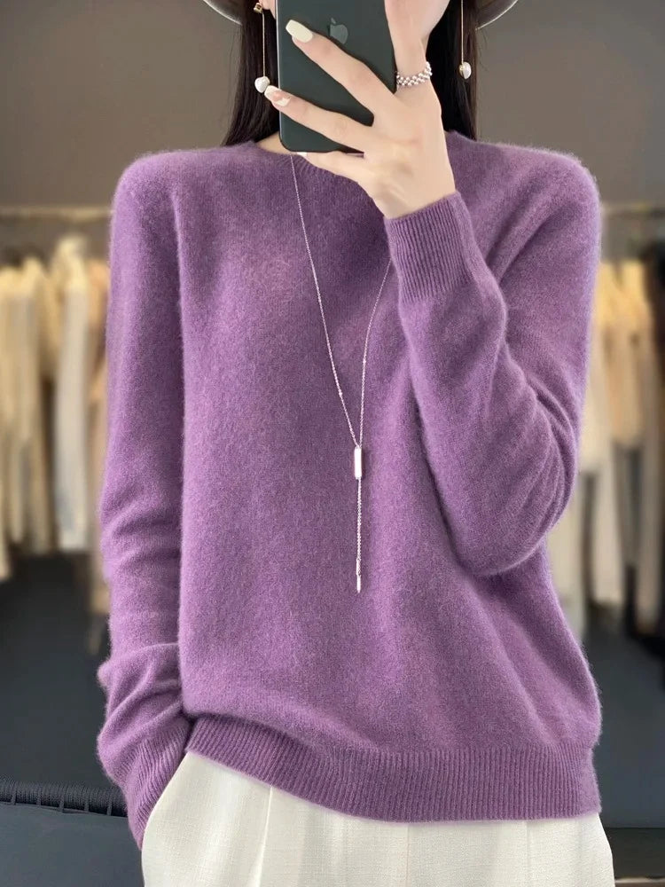 Full-length view of women's crew neck jumper with long sleeves