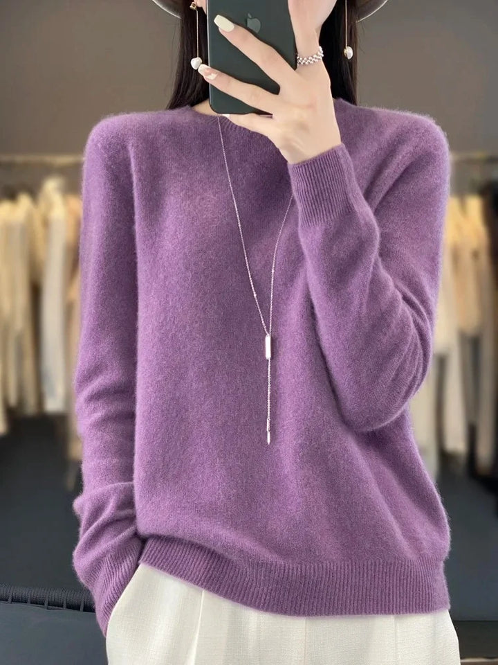 Full-length view of women's crew neck jumper with long sleeves