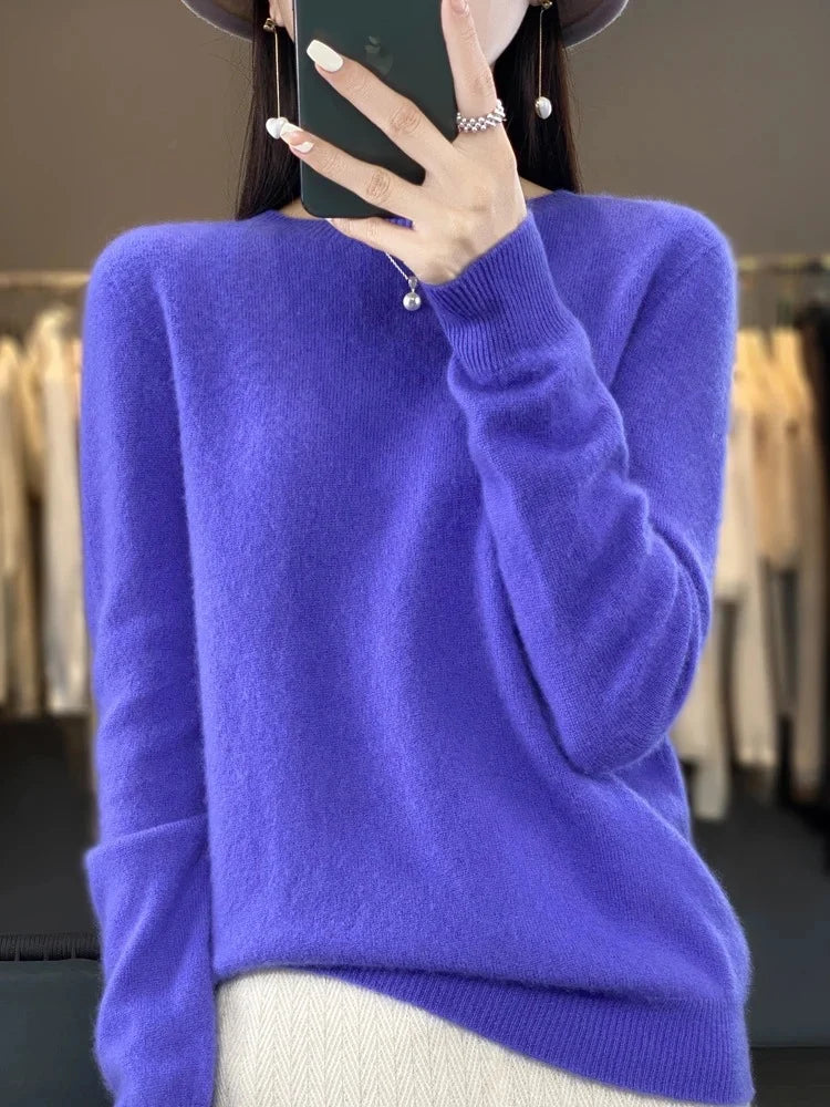 Women's knit jumper in beige showing soft drape and texture