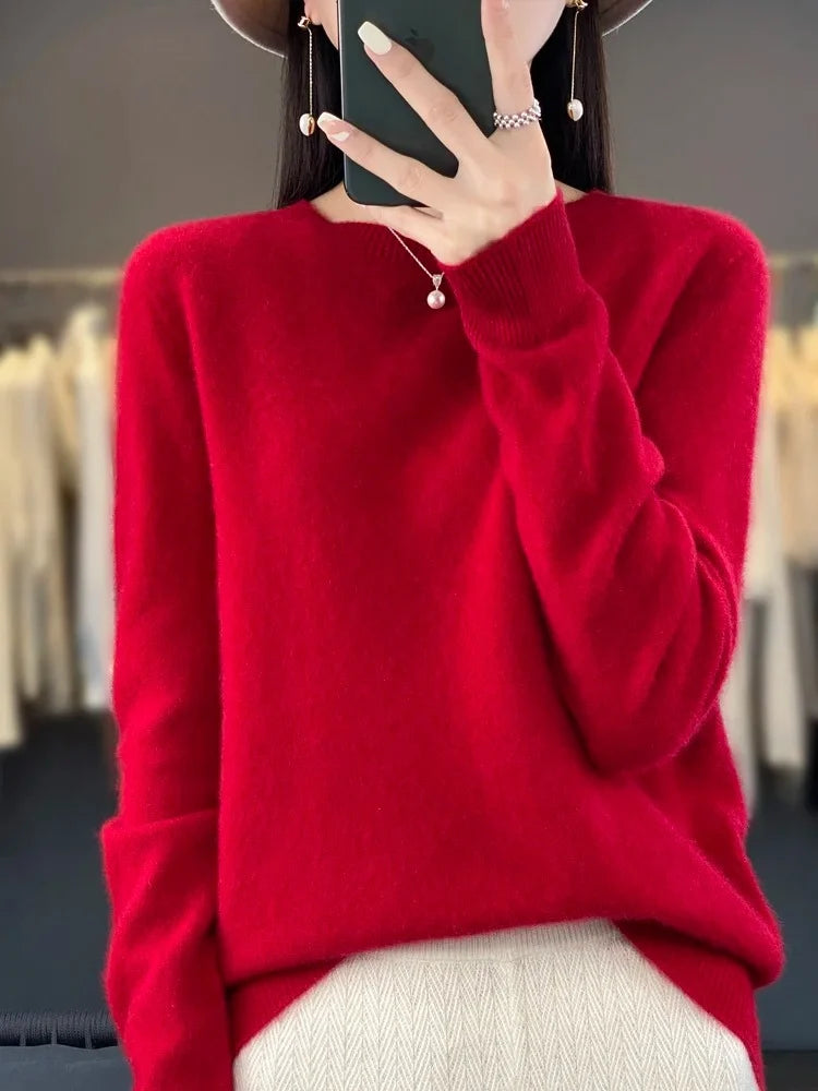 Women's hip-length jumper styled with herringbone trousers