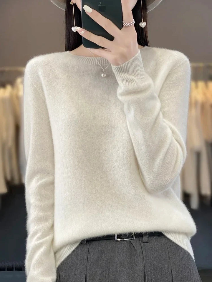 Detail view of ribbed collar on women's crew neck jumper