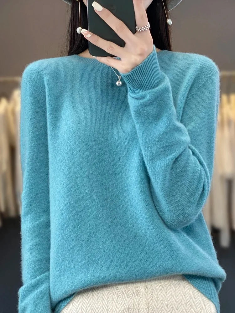 Close-up view of women's knit jumper showing soft texture and crew neckline