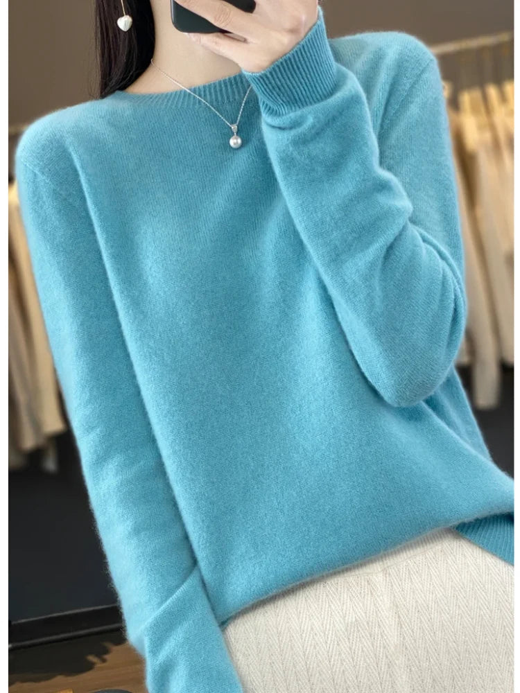 Detail shot of ribbed crew neckline on women's knit jumper