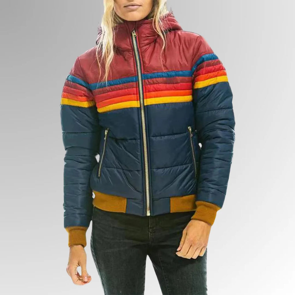 Front view of women's hooded puffer jacket showing horizontal quilted sections and chest stripes