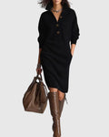 Woman wearing black ribbed knit midi dress with button-up neckline and long sleeves paired with brown boots