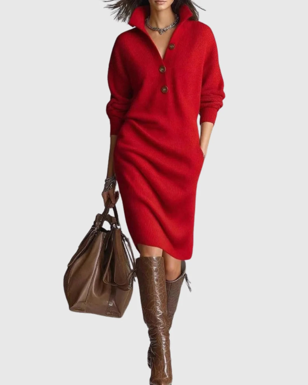 Side view of relaxed fit knit midi dress with collared neckline and practical pockets