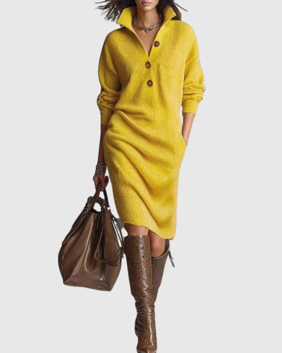 Full-length view of black knit midi dress styled with knee-high boots for autumn wear