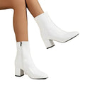 Women's cream ankle boots with block heel showing smooth finish and ankle-height cut