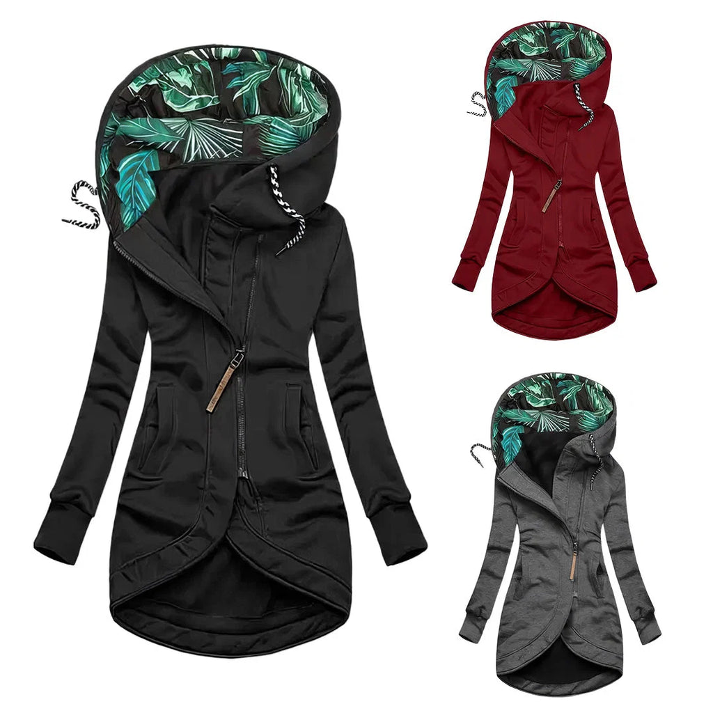 Side view of women's black parka jacket with relaxed fit and dropped hem