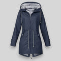Women's hooded rain jacket in navy with striped lining and full-zip front closure