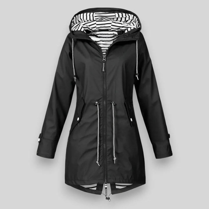 Navy women's rain jacket with striped hood lining and adjustable drawstring waist feature