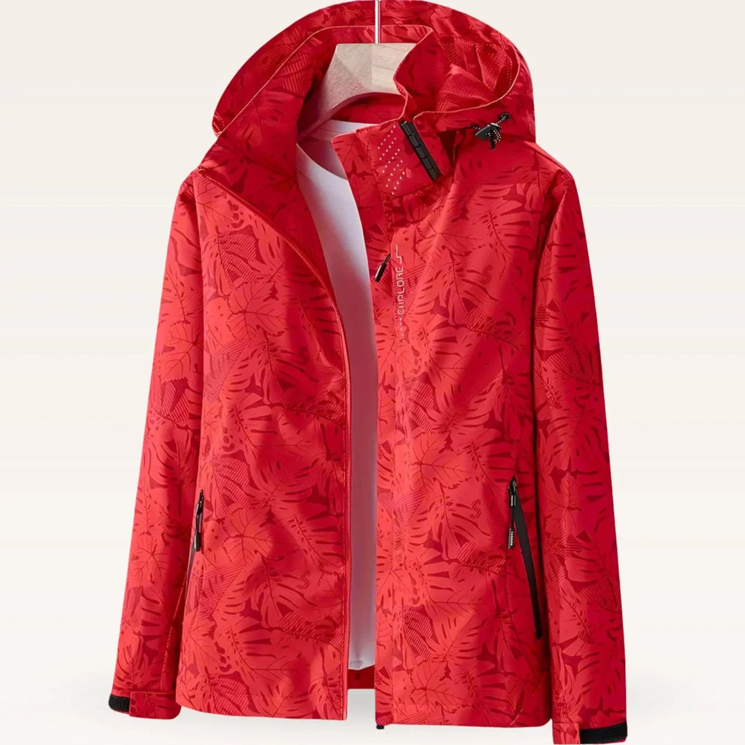 Detail of adjustable drawcord hood on women's tropical print windbreaker jacket