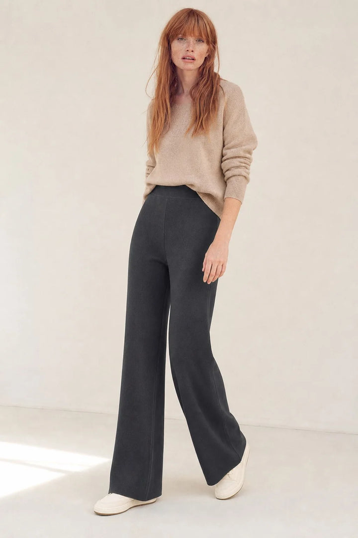 Close-up of Merino Pants side pocket detail and soft knit fabric finish
