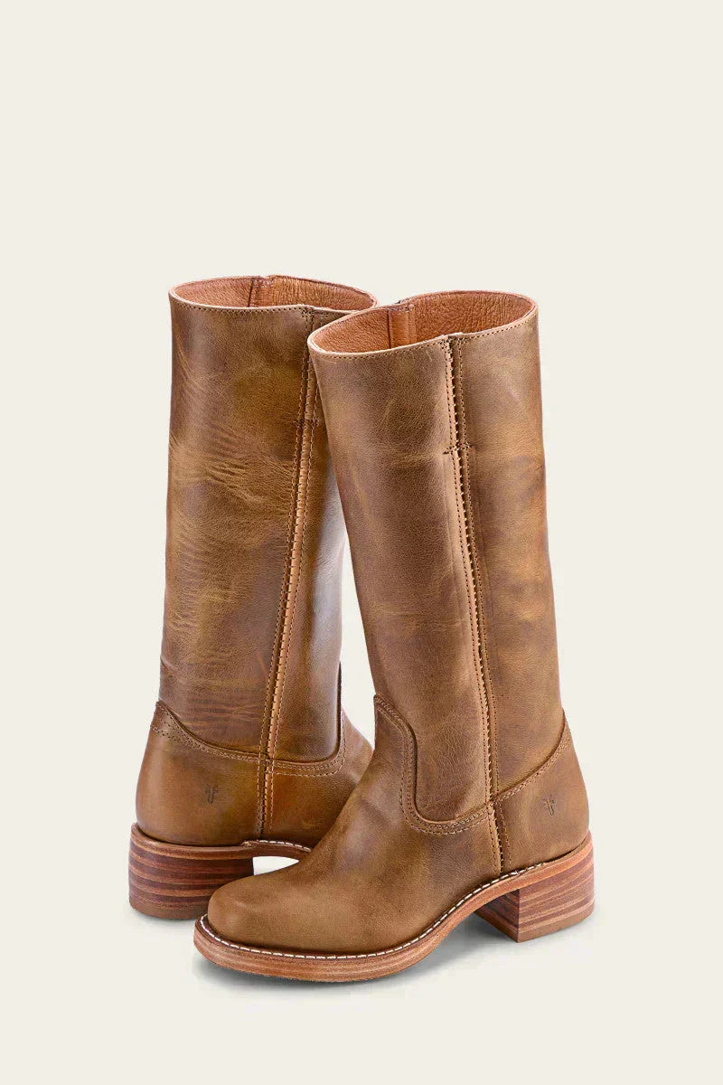 Side view of women's mid-calf boots showing structured shaft and block heel base