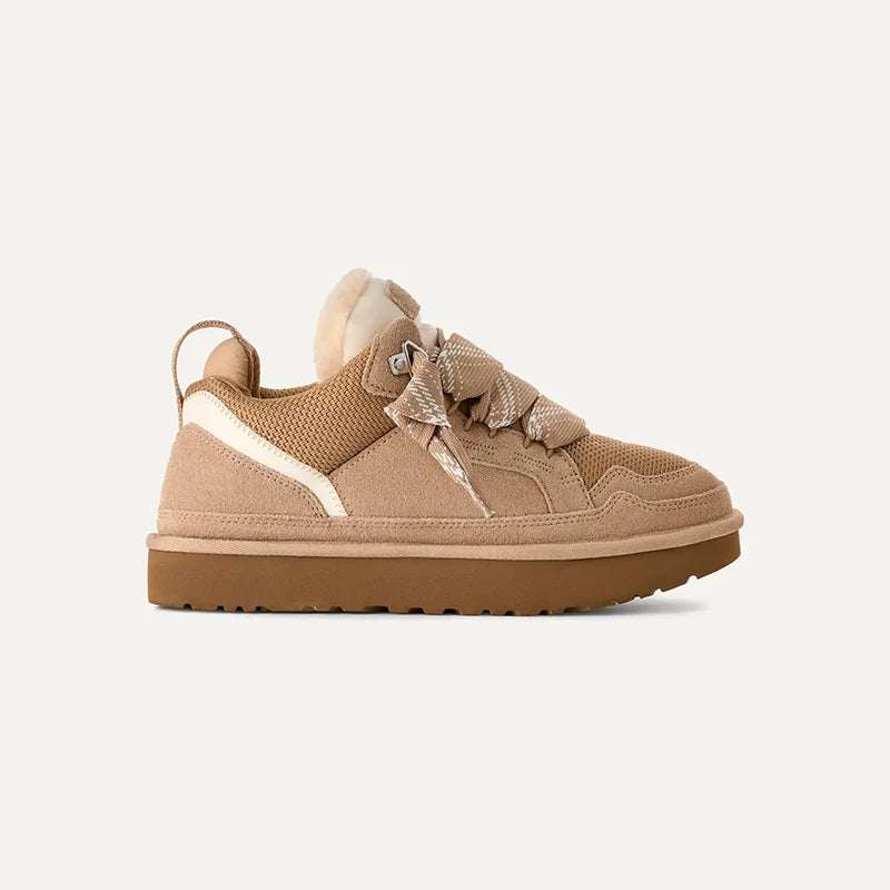 Close-up of women's platform trainers showing textured finish and lace-up detail