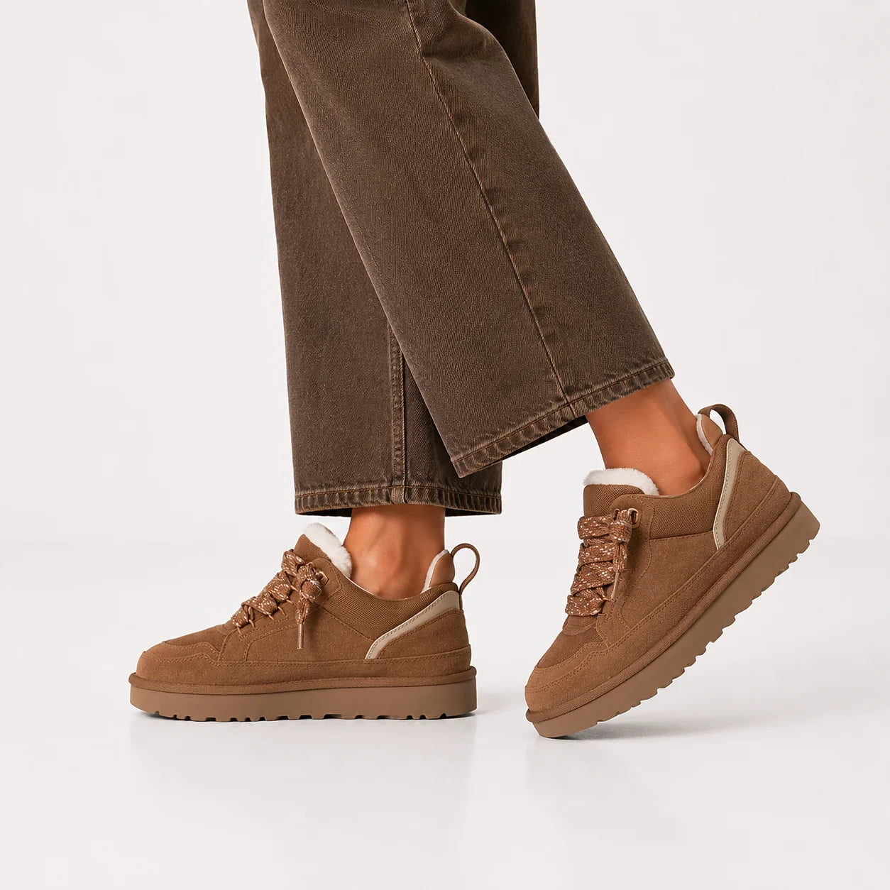 Women's platform trainers in brown colourway with fleece trim and supportive sole