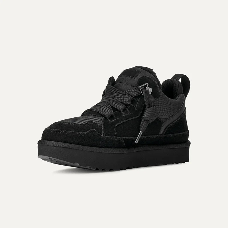 Women's platform trainers on model showing relaxed fit and chunky sole design