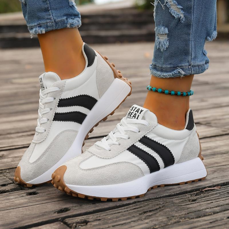 Women's burgundy trainers with gum sole and traction lugs for reliable everyday wear