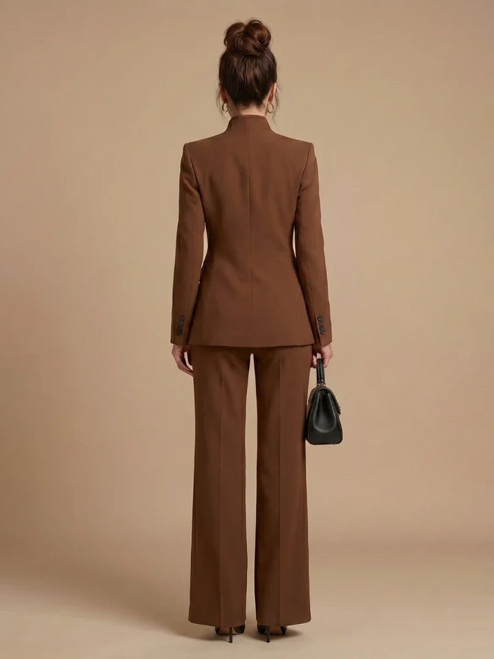 Women's stand collar blazer in cream with structured shoulders and side pockets